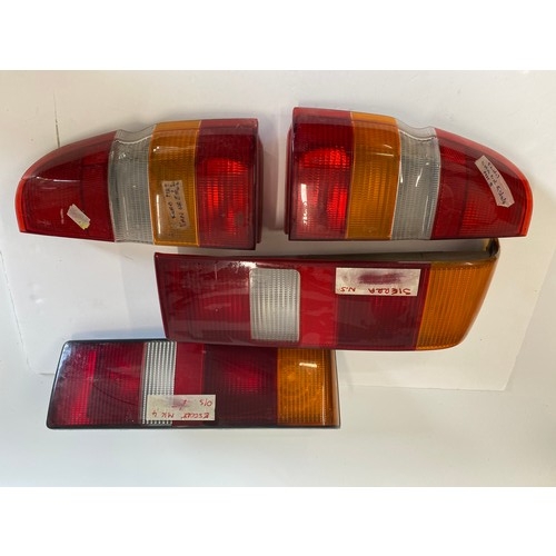 242 - Ford rear lights x4, A pair label reads 'MK 5 van or estate' one Escort  MK4 o/s, Sierra n/s.