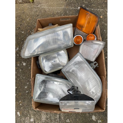 250 - Mixed headlights, spotlights etc, for various vehicles including Peugeot and Ford etc.