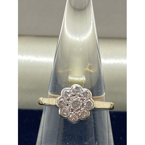 205 - 18ct gold flower cluster diamond ring, hallmarked London, approx size L, approx gross weight 3.5g