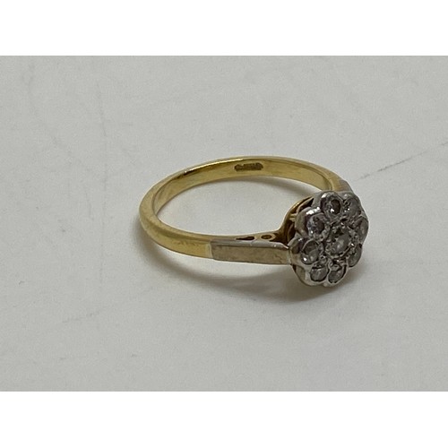 205 - 18ct gold flower cluster diamond ring, hallmarked London, approx size L, approx gross weight 3.5g