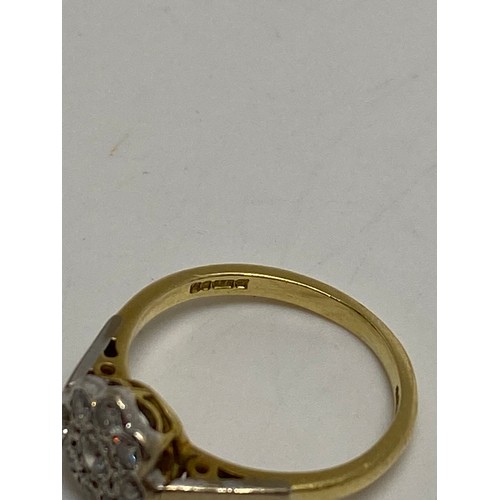 205 - 18ct gold flower cluster diamond ring, hallmarked London, approx size L, approx gross weight 3.5g