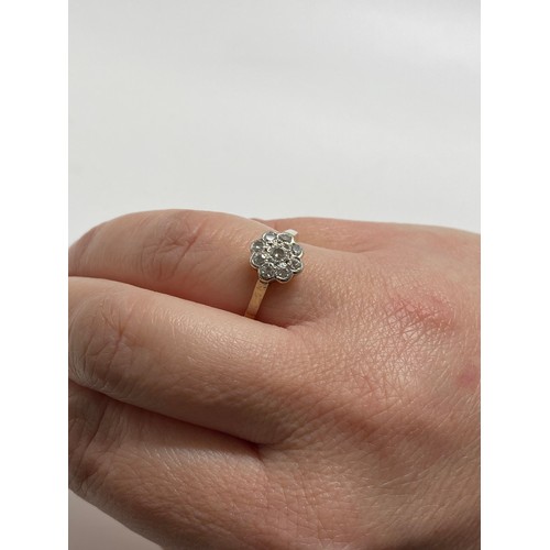 205 - 18ct gold flower cluster diamond ring, hallmarked London, approx size L, approx gross weight 3.5g