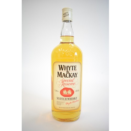 16 - One Litre bt Whyte&Macklay Special Reserve, 43%, 1980s. One Tubed bt. Bushmills Malt Irish Whisky, 7... 