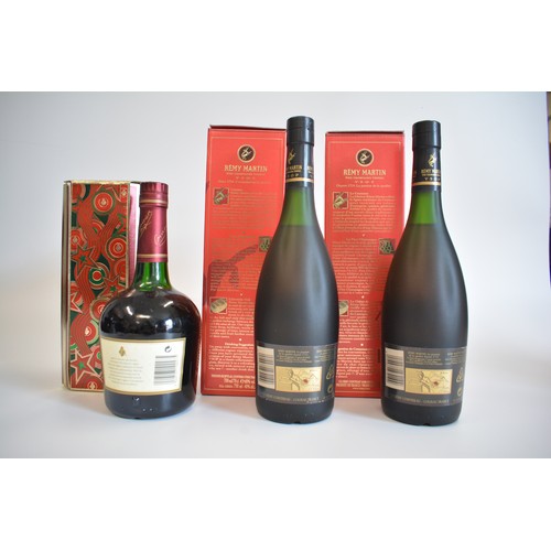 24 - Two Boxed bottles Remy Martin VSOP Cognac, 70cl, 40%. 1990s. One Boxed bt. Courvoisier VS Cognac, 70... 