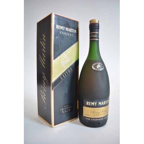 25 - One Litre Boxed Remy Martin VSOP Cognac, 43% 1990s. One Boxed bt. Grand Armagnac VSOP Janneau, 70cl,... 