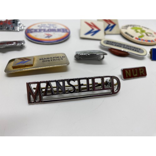 45 - Small selection of vehicle-related pin badges including national Express, Mansfield district bus etc