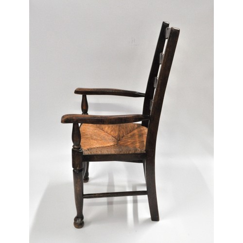 70 - Child's Ladderback oak chair with reeded base, height 76cms, width 42cms