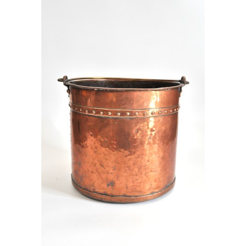 72 - Victorian copper coal/log bucket with rivet trim, brass handle, height 31cms