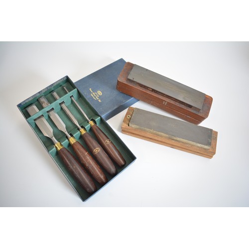 79 - Box of hand made chisels by Crown Tools together with honing stones