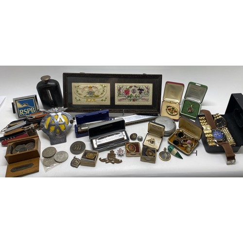 89 - Mixed ephemera consisting of badges, medallions, harmonica/mouth organs, hip flask, cufflinks, pen k... 