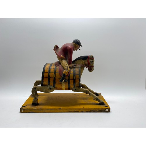 129 - Breweriana Interest -   Painted huntsman riding hobby horse with barrell body design, believed to be... 