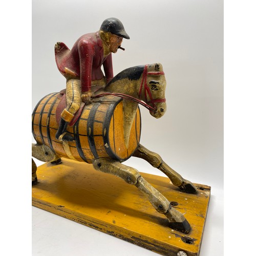 129 - Breweriana Interest -   Painted huntsman riding hobby horse with barrell body design, believed to be... 