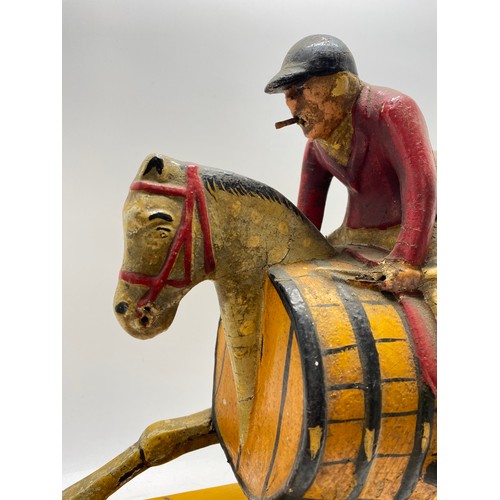 129 - Breweriana Interest -   Painted huntsman riding hobby horse with barrell body design, believed to be... 