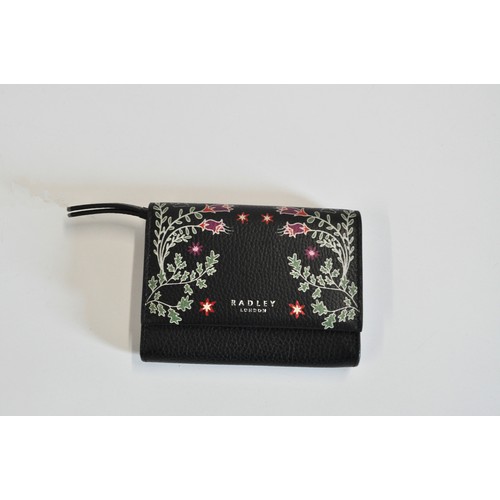 228 - Radley black purse, new, with tag and dustbag