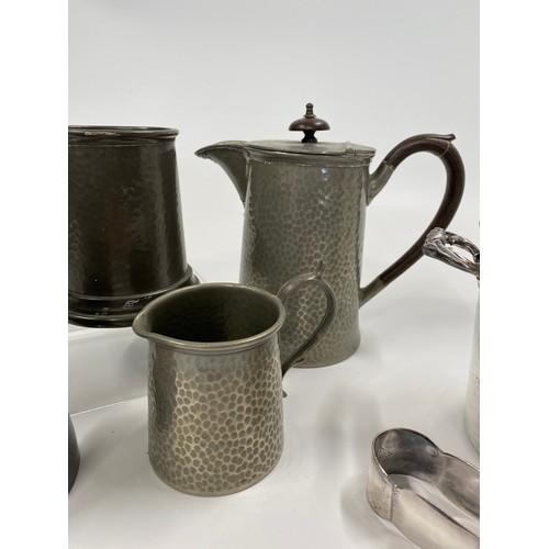 232 - A collection of pewter and silver plate tankards, including one engraved 'HMS Tyne' Flagship of the ... 