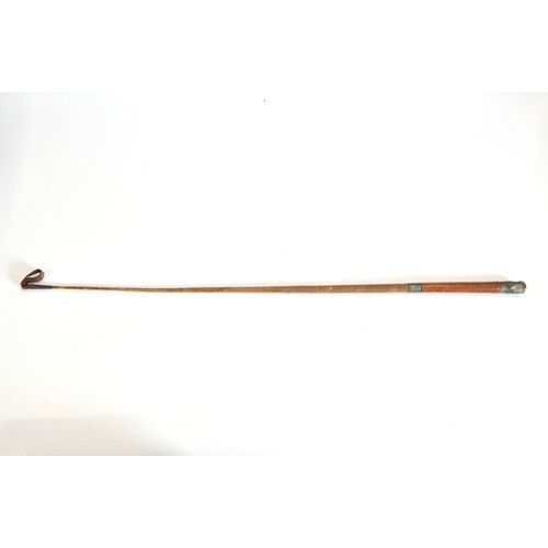 241 - Estimated WW1 1914-1918  solid nickel spurs and a Royal Artillery leather handle riding crop. A/F