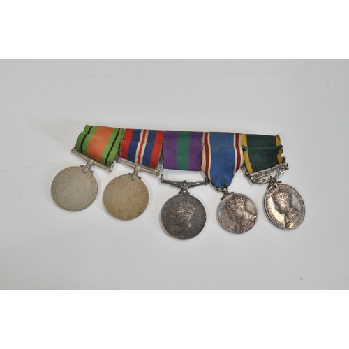 250 - Medal bar some medals attributed to 2025495 SJT A R Harman A.P.T.C,  George VI medal, George VI Coro... 