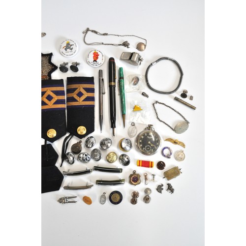 252 - Various items Consisting of Merchant Navy epaulettes, badges, buttons, an Ingersoll 'leader' pocket ... 