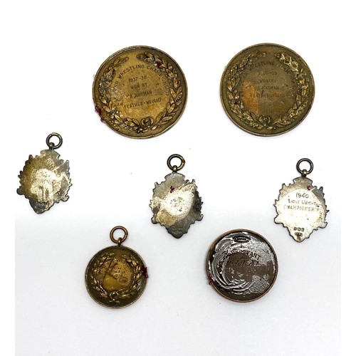 254 - National Amateur Wresting  Association bronze and silver medals/medallions, some attributed to A Har... 