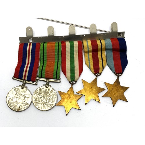 257 - WW2 medal bar containing x5 medals including The Africa Star 1st Army plus The Battle of Dunkirk 194... 