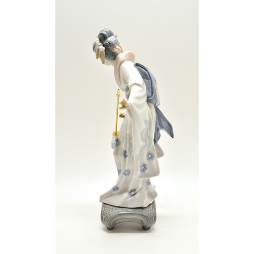 261 - Lladro Teruko 'Geisha girl' with flowers, Approx H29 cms. 1983. AF - had repairs