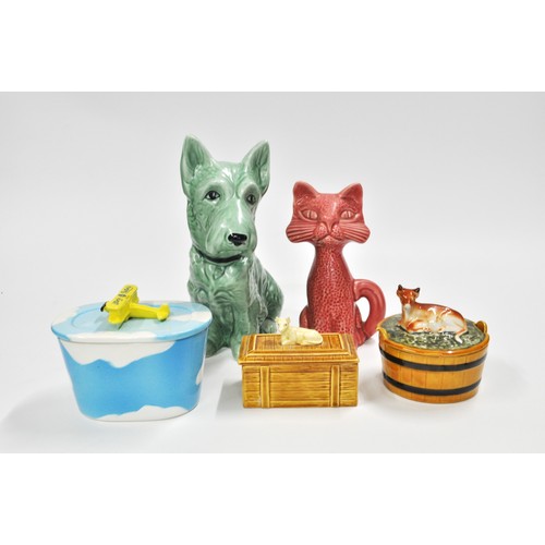 269 - Mixed ceramics including Sylvac dog, pink cat money box, and butter dishes.