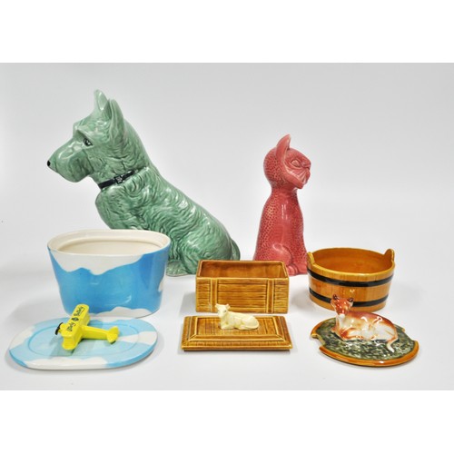 269 - Mixed ceramics including Sylvac dog, pink cat money box, and butter dishes.