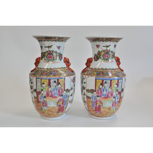 275 - A pair of Chinese Canton Famille Rose vases, approx H38m.