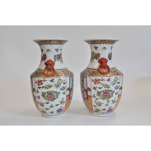 275 - A pair of Chinese Canton Famille Rose vases, approx H38m.