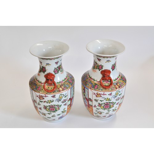 275 - A pair of Chinese Canton Famille Rose vases, approx H38m.