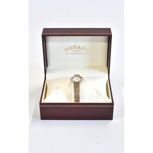 278 - 9ct yellow gold and diamond Rotary Elite wristwatch, featuring an oval white dial with round cut dia... 