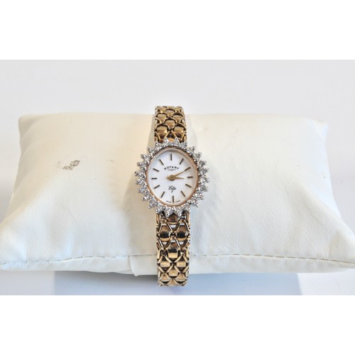 278 - 9ct yellow gold and diamond Rotary Elite wristwatch, featuring an oval white dial with round cut dia... 