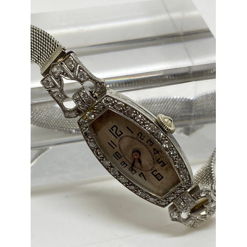 282 - Art Deco 17 jewels Ladies cocktail watch with x48 diamonds, fine mesh watch strap stamped 18K, insid... 