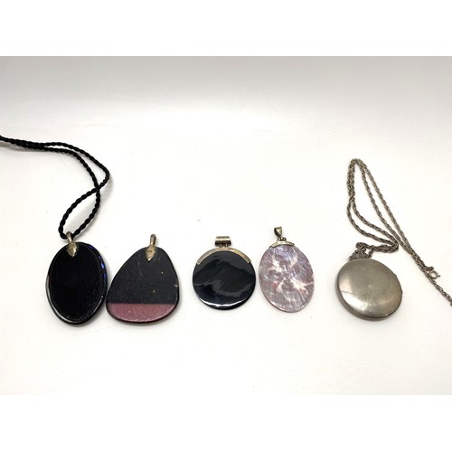 295 - Group of silver and glass substantial pendants together with large silver locket and chain