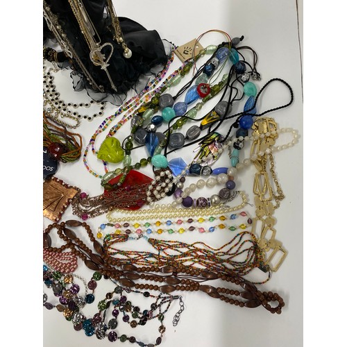 298 - A large quantity of mixed costume jewellery items including Franklin Mint boxed necklace, Debra Fox ... 