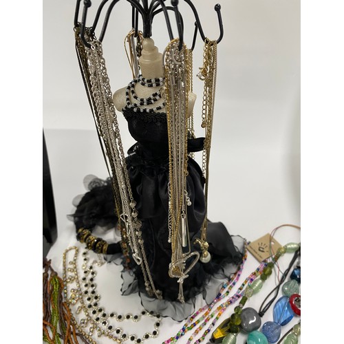 298 - A large quantity of mixed costume jewellery items including Franklin Mint boxed necklace, Debra Fox ... 