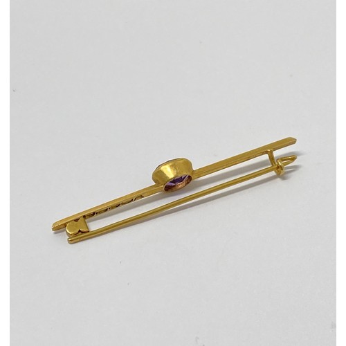 301 - Gold and ameythst brooch stamped 750 marked H.W. total gross weight 2g.