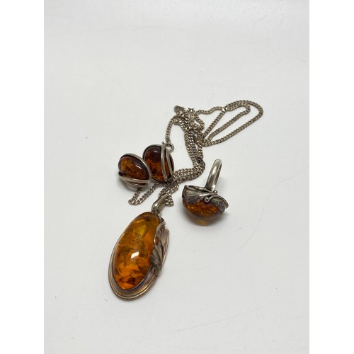 309 - Silver and amber pendant necklace, ring and earrings, stamped 925