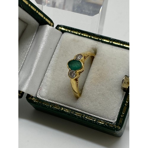 312 - 18ct yellow gold emerald and diamond ring, hallmarked London, approx size M, gross weight 3.15gr