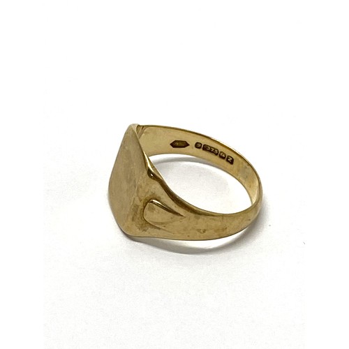 317 - 9ct yellow gold signet ring size R, hallmarked Birmingham, together with 9ct gold cross pendant, hal... 