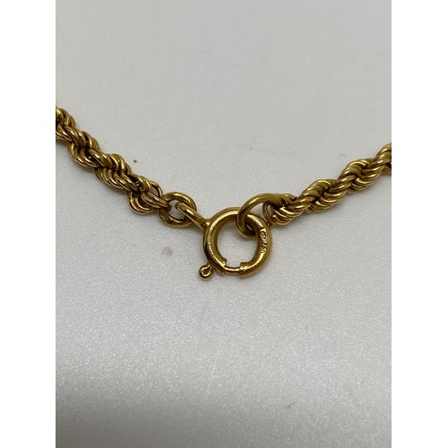 323 - Yellow gold rope chain necklace, stamped 750, approx length 24'' approx gross weight 24.45 gms