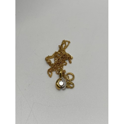 324 - 18ct yellow and white gold diamond pendant, approx 0.15ct hallmarked Birmingham, on 18ct yellow gold... 