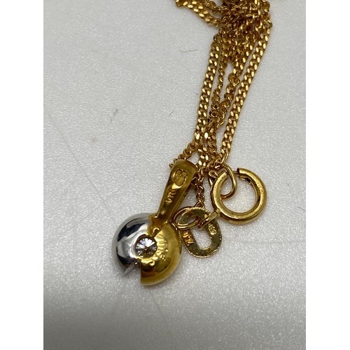 324 - 18ct yellow and white gold diamond pendant, approx 0.15ct hallmarked Birmingham, on 18ct yellow gold... 