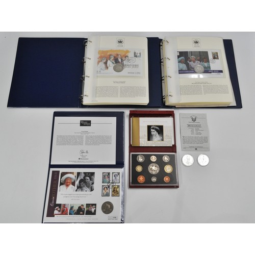 332 - Two albums of The Queens Golden Jubilee coin covers together with 2001 Silver Eagle USA One Dollar .... 