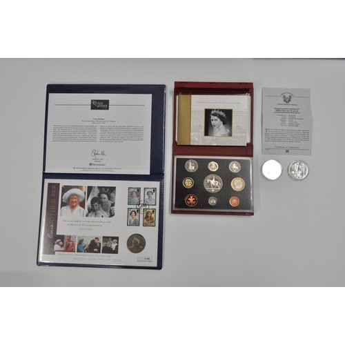 332 - Two albums of The Queens Golden Jubilee coin covers together with 2001 Silver Eagle USA One Dollar .... 