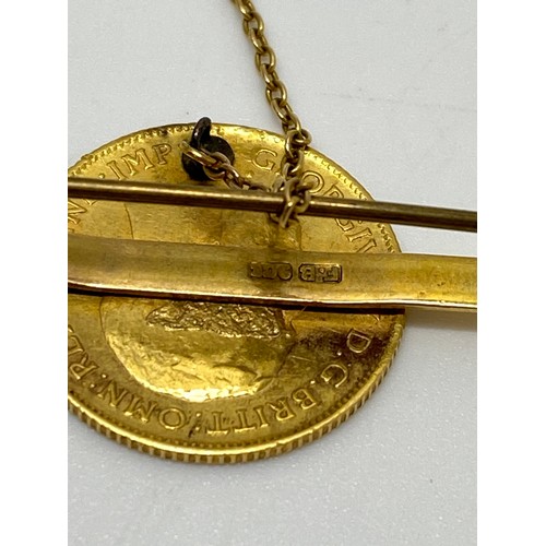 339 - 1911 gold (half) sovereign 9ct gold bar brooch with safety chain, gross weight 6.75 gms.AF