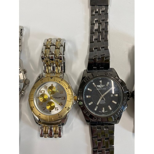 284 - A group of Gents wristwatches including one marked London Diamond Co, two marked Breitling and vario... 