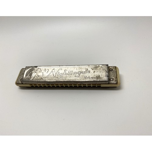 23 - Vintage Tri-ang 'Nightingale' mouth organ/harmonica with warbler emblem