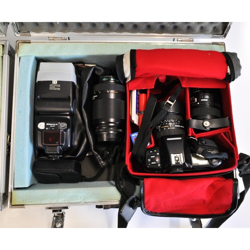 28 - x2 Aluminium cases containing predominately Nikon photography items consisting Nikon F90X camera bod... 