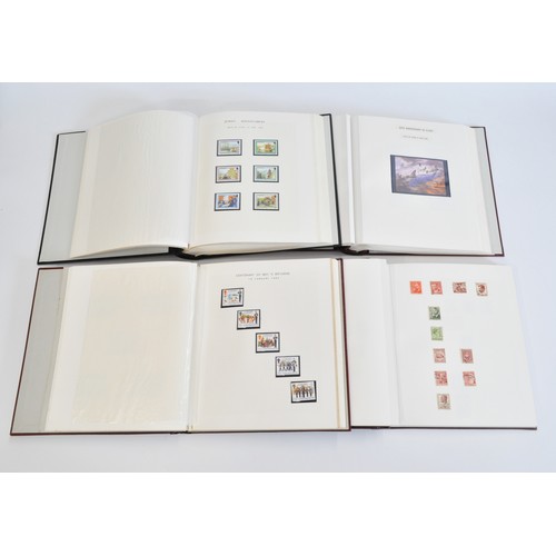 32 - x4 albums of mixed stamps predominantly Jersey, Guernsey and other British stamps etc.